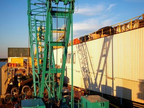 Industrial Container Rotators: Exploring Hydraulic, Electric, and Mechanical Designs